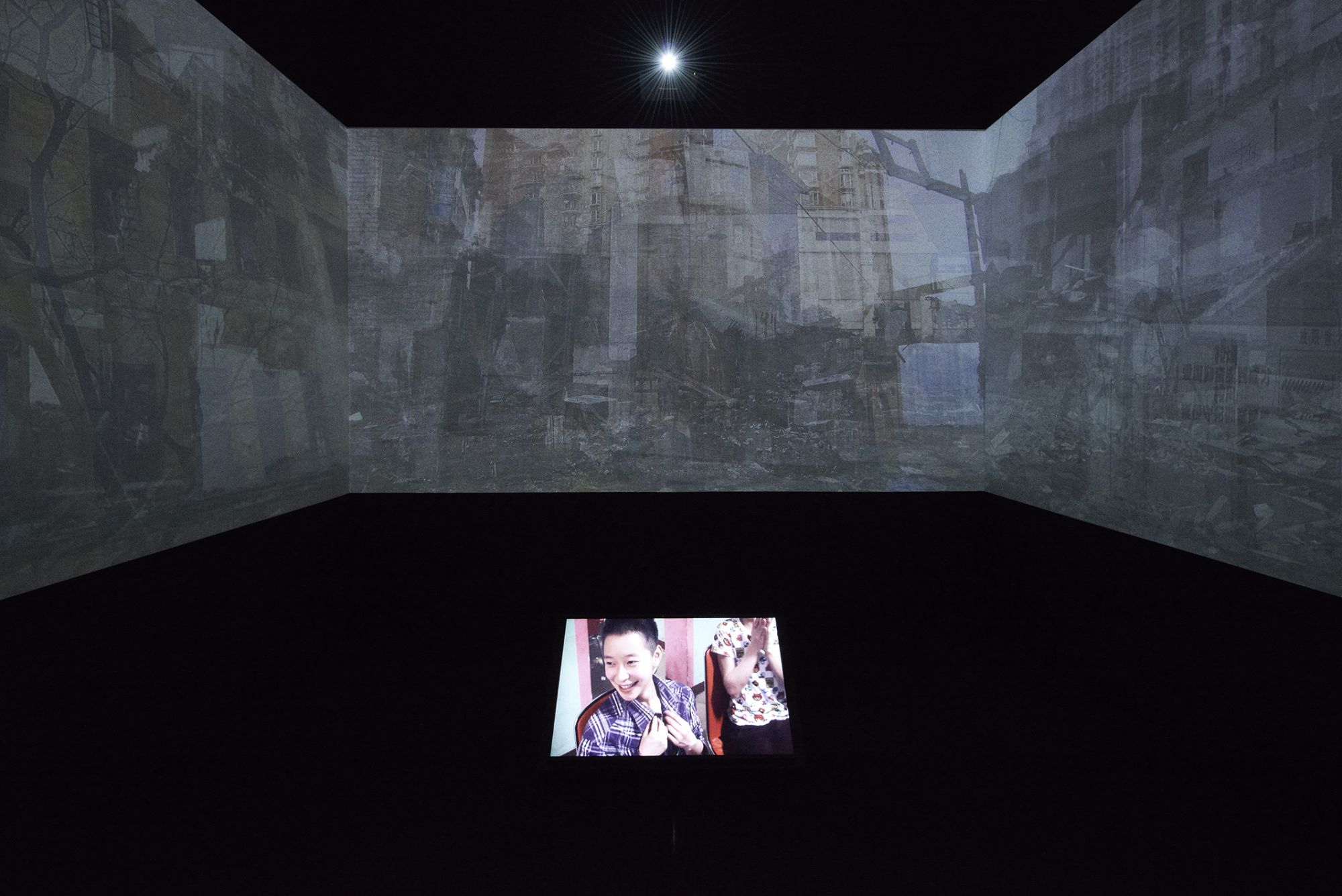 Exhibition view of Go-Betweens: The World Seen Through Children, 2014 Lost Boundaries (잃어버린 경계들) & Wounded (상처 입은), Video installation, color, 2014